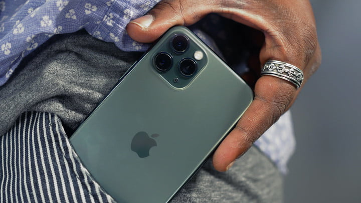 A person keeps in his pocket the iPhone 11 Pro, one of the best waterproof phones